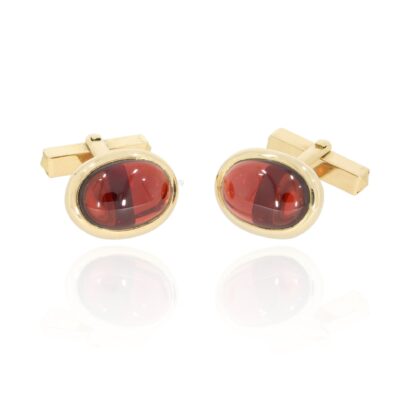 Gold cuff links garnet