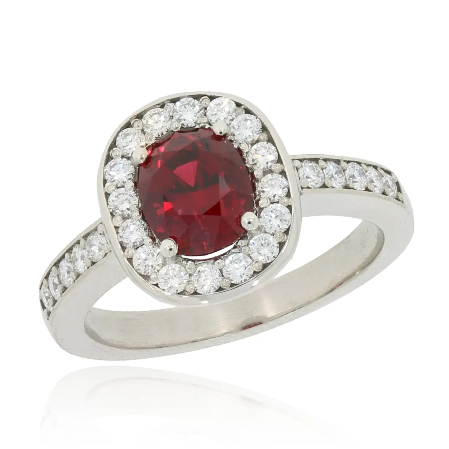 Red spinel diamond halo ring